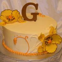 Fall Themed Anniversay Cake For a 1 year anniversay to incorporate the fall colors of the wedding. Sugarpaste flowers.