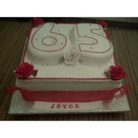 Number 65 Cake WASC cake (number and bottom) with almond flavored buttercream. The numbers were covered in Satin Ice fondant. The flowers are edible and...