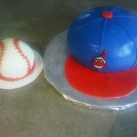 Baseball Hat Cake Red Velvet with cc filling. Themed for an "Indians" birthday.Small baseball smash cake