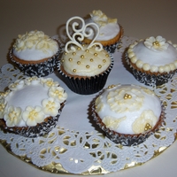 Wedding Cupcakes I'm practicing for a friends wedding. Very small affair and I'm making cupcakes. All buttercream and RI