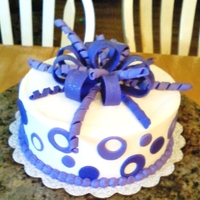 Bow Cake Butter cream icing and fondant bow. Chocolate cake with a whipped choc. filling.