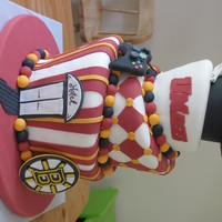 Graduation Cake This was made for a college graduation. My first try at a topsy turvy cake. All decoration is fondant.