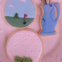 Golf Cookies Golf was my grandfather-in-law's passion. These were made for his memorial service.Inspired by the many golf cookies here on CC.