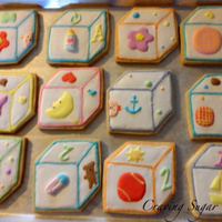 Baby Blocks Made these as a surprise baby shower favor for a good friend. Each cookie ended up with up a peeking baby. Inspired by I am Baker.