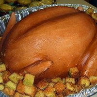 Thanksgiving Turkey Inspired by the many wonderful cakes here on Cake Central. Made from 13x9 layers carved into the breast/body. Wings are made from sugar...