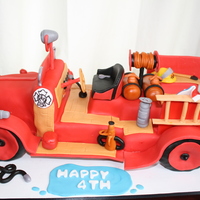 Fire Dept.'s 4Th Of July Luncheon yellow cake with chocolate buttercream covered in fondant.