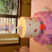 Angelina Ballerina Birthday Cake Angelina Ballerina is gumpaste. Top tier is buttercream and fondant flowers and bottom tier is gumpaste and tylose powder.