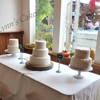 Rustic Wedding Cake Combed Petal And Rosette Butterceam Techniques Adorn This Rustic Wedding Cake Rustic Wedding Cake. Combed, petal, and rosette butterceam techniques adorn this rustic wedding cake.