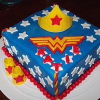 Wonder Woman Cake This is a 12" square, 2-layer cake with buttercream and MM fondant.