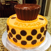 Reese Cup Cake Top cake is a chocolate mold made in the bottom half of an Extra Large Cupcake pan. It has two chocolate cake layers with peanut butter...