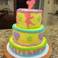 Gymnastic Cake Layered Buttercream with Fondant figures and symbols. I used cookie cutters to cut the fondant.