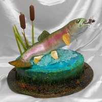 Rainbow Trout Cake This is my first attempt at such a cake. The trout is rice crispy treats with a wire armature, covered in fondant and airbrushed with food...