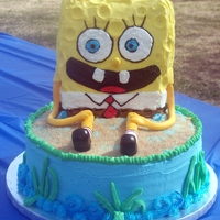 Spongebob Cake My first SpongeBob cake, SpongeBob is rice crispy w/buttercream and fondant decorations, cake is chocolate with buttercream.