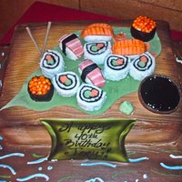Sushi Complete I had posted the sushi at an earlier time. Friends bakery made the cake and asked me to make the sushi on top.