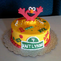 Surprise...it's Me Elmo!!! Buttercream with modeling chocolate elmo. Inspiration from Tracij here on cc