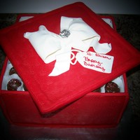 Box Of Chocolates Birthday Cake 10 inch cake with fondant-gumpaste mix for the box and lid. First time playing around with making cake balls. It was fun making this cake...