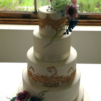 5 Tier Wedding Cake With A Peacock Theme The Bride And Groom Had Some Art Work Commissioned For Their Invitations Etc That Consisted Of Bl... 5 tier wedding cake with a peacock theme. The bride and groom had some art work commissioned for their invitations etc, that consisted of...