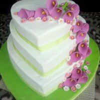 1314749421.jpg I had 48 hours notice on this cake! 12", 10" and 8" hearts. Bottom tier chocolate, top 2 cherry vanilla with buttercream...