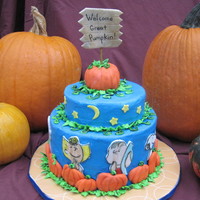 It's The Great Pumpkin Charlie Brown! Chocolate Pumpkin Swirl cake with buttercream frosting and fondant decorations. Large pumpkin on top is Rice Krispie Treats. Saw this on...