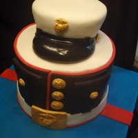 Usmc Retirement Coconut cake with coconut frosting, Cover is made of RKT. Thanks to LuluSweetArt for the inspiration!