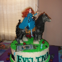 Brave Party 16" yellow and chocolate rounds stacked cakes covered with butter cream. Accessories are made from fondant. Angus is made out of RKT...