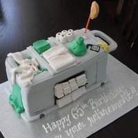 Hospitality Cart This cake celebrated a woman's 65th birthday and retirement from a hotel housekeeping staff.