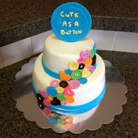 Cute As A Button Baby Shower Cake This cake was covered in fondant with fondant buttons and border. Text on the larger button and the threads of some of the buttons is royal...