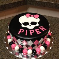 Monster High Cake is covered in fondant with fondant accents.