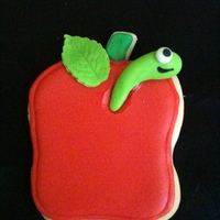My 1St Decorated Cookie My 1st cookie - an apple. Gonna need some practice with these, but I had so much fun making it. Think the little worm is too cute! ;0)
