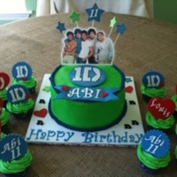 "one Direction" Cake And Cupcakes One Direction cake made for 11th birthday party. Birthday girl wanted green and blue colors. Everything is edible except for picture and...