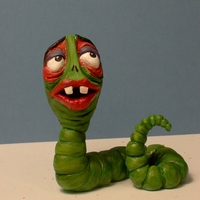 'maggot' From Corpse Bride Modeling chocolate with edible paints.