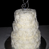 Rose Wedding Cake Choc. cake with whipped choc. ganache filling.