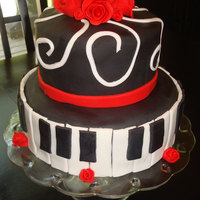 Music Piano Cake I made this for a couple where the guy is a musician. This was the most success I've had with making roses. I got my inspiration for...