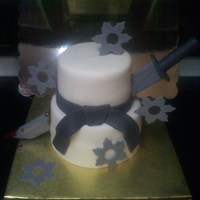 Ninja Ninja birthday cake, gumpaste sword and stars