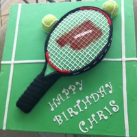 Tennis Racquet Tennis racquet cake I made for my husbands birthday. Chocolate with chocolate ganache. Strings are RI.