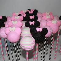 Pink Minnie Mouse Cake Pops On Paper Straws Pink Minnie Mouse cake pops on paper straws.