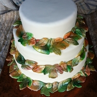 Fall Wedding Cake Ivory fondant with hand made and painted leaves