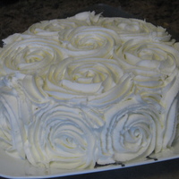 Rose Cake Finally caved and tried out the I Am Baker design! Decided to use it for my Mom's Mother's Day Cake!! She loved it!