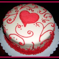 Valentine Fondant Cake Fondant covered with buttercream icing used to pipe the design.