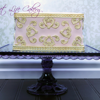 Chocolate Cake Covered In Fondant Used The Wilton Baroque Mold For The Gold Chocolate cake covered in fondant, used the Wilton Baroque mold for the gold.