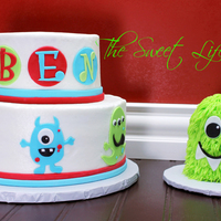 Monster Birthday Cake Made To Match Invitation With Matching Smash Cake Yellow Cake And Chocolate Cake Covered In Bc With Fondant Accents Monster birthday cake made to match invitation with matching smash cake. Yellow cake and chocolate cake covered in BC with fondant accents...