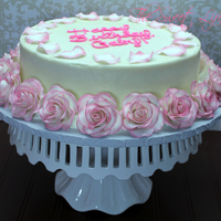 Strawberry Cake Covered In Bc With Gum Paste Roses And Rose Petals Customer Asked For A Cake Just Like Selena Gomezs Rose Cake Strawberry cake covered in BC with gum paste roses and rose petals. Customer asked for a cake just like Selena Gomez's rose cake.