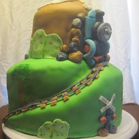 My First 3D Cake: Thomas No laughing! LOL This was a chore to do and yes I cried when it was destroyed. LOL This for my nephews 3rd birthday. I left the layers...