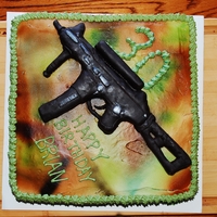 Modern Warfare 3 12" cake with RKT gun covered in fondant, airbrushed. First time using the airbrush and creating something with RKT - pretty happy...