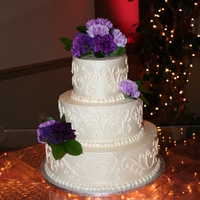 Ivory Wedding Cake This was my first wedding cake! I stressed over it for months but it went really smoothly.. whew! Iced in SMBC and I used a pearl lustre...