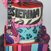 Glam-Rock Birthday Cake This cake was for a seven year old girl who wanted her cake to be super colorful with lots of print and glam.