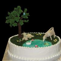 Pegasus & Unicorn This was my first attempt at using modeling chocolate. The pegasus, unicorn and tree were modeling chocolate. The leaves were royal icing...