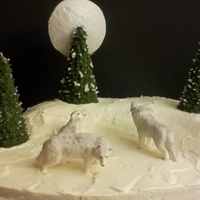 White Wolves Wolves made of fondant/gum paste, trees made of ice cream cones covered with royal icing.