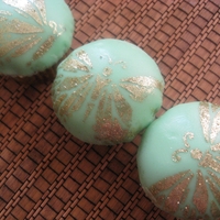 Shimmery Buterflies Rose- pistacio cupcakes, decorated with lustre dust buterflies.