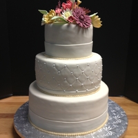 Vintage Wedding Cake 3 tiered wedding cakeFondant covered with gumpaste daisies and filler flowers